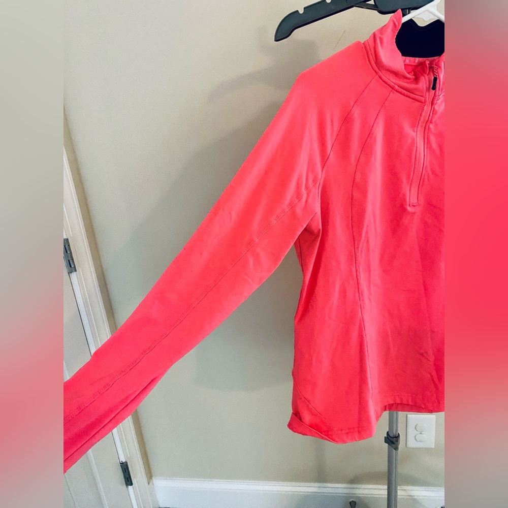 Activewear Women’s Quarter-zip pullover, with thumb hole sleeves and back pocket